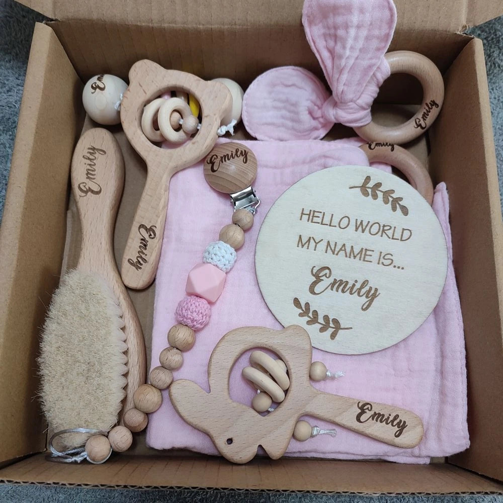 Wooden baby gift box with rattles and teething ring