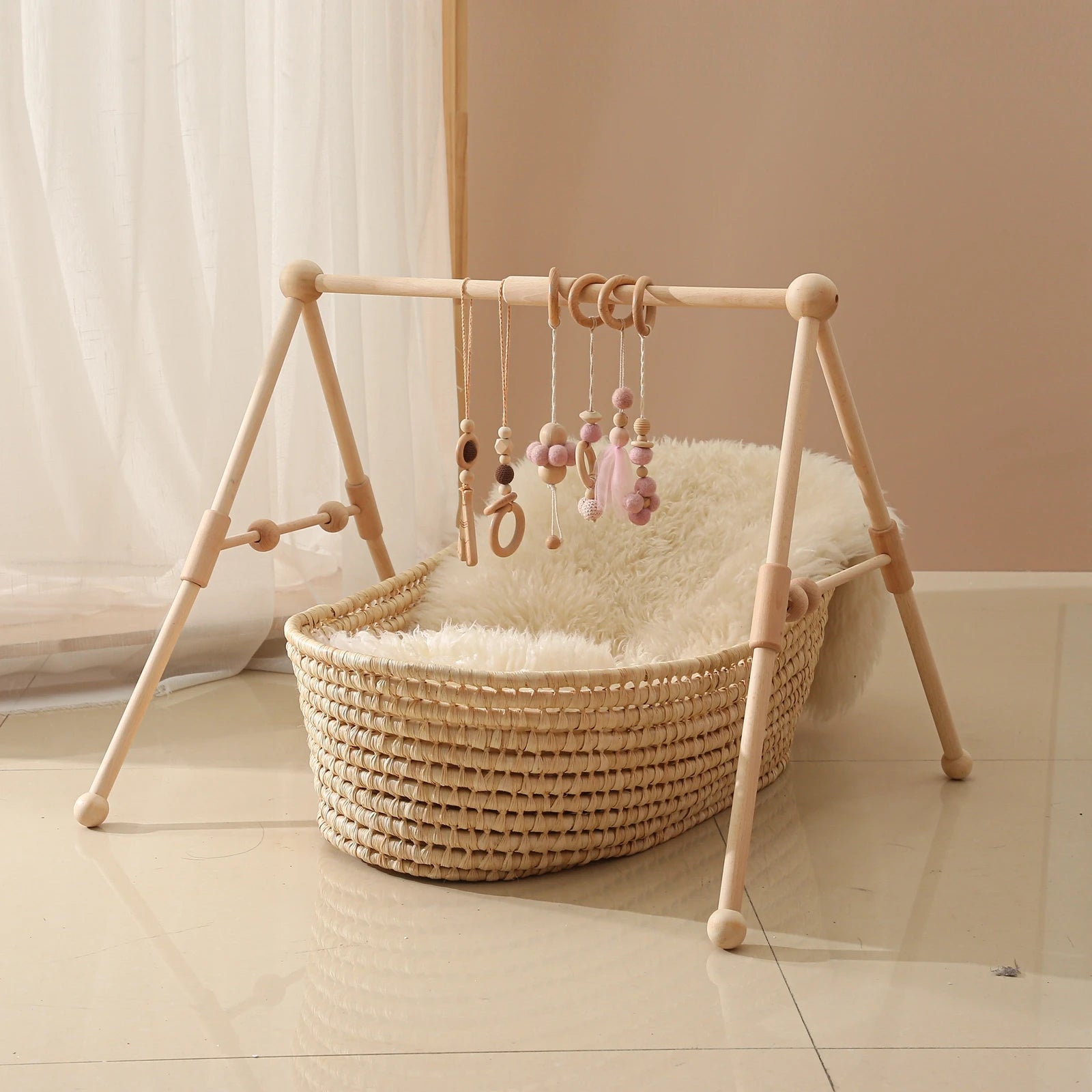 Wooden baby play gym with Scandinavian minimalist design
