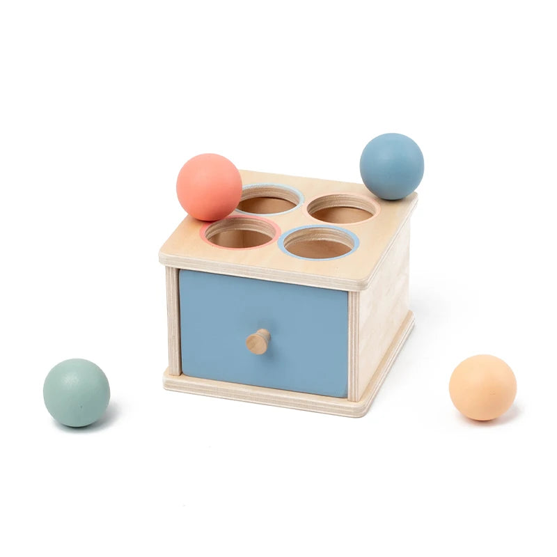 Montessori sensory toy with marble track detail