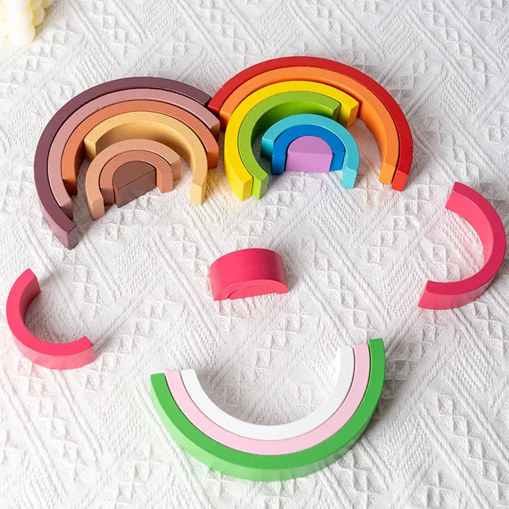 Montessori wooden rainbow stacker in soft pastel colors