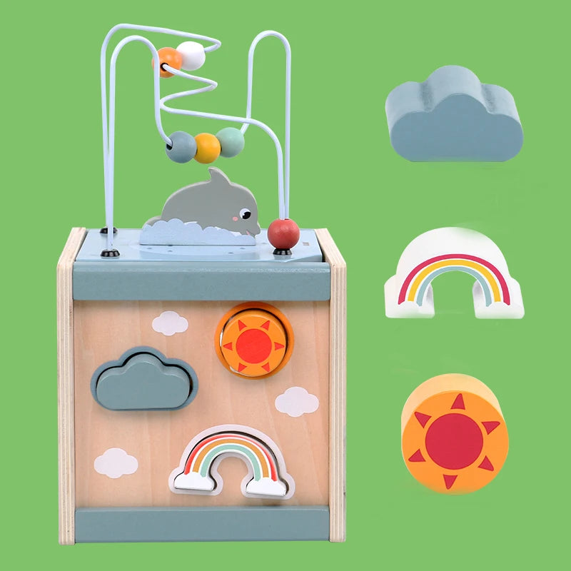Wooden activity cube showing shape sorter side